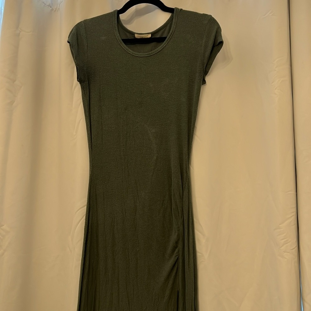 Stretchy Lovestitch dress with touching and slit on leg